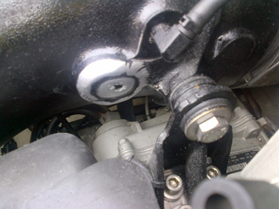 Exhaust manifold core plug water leak